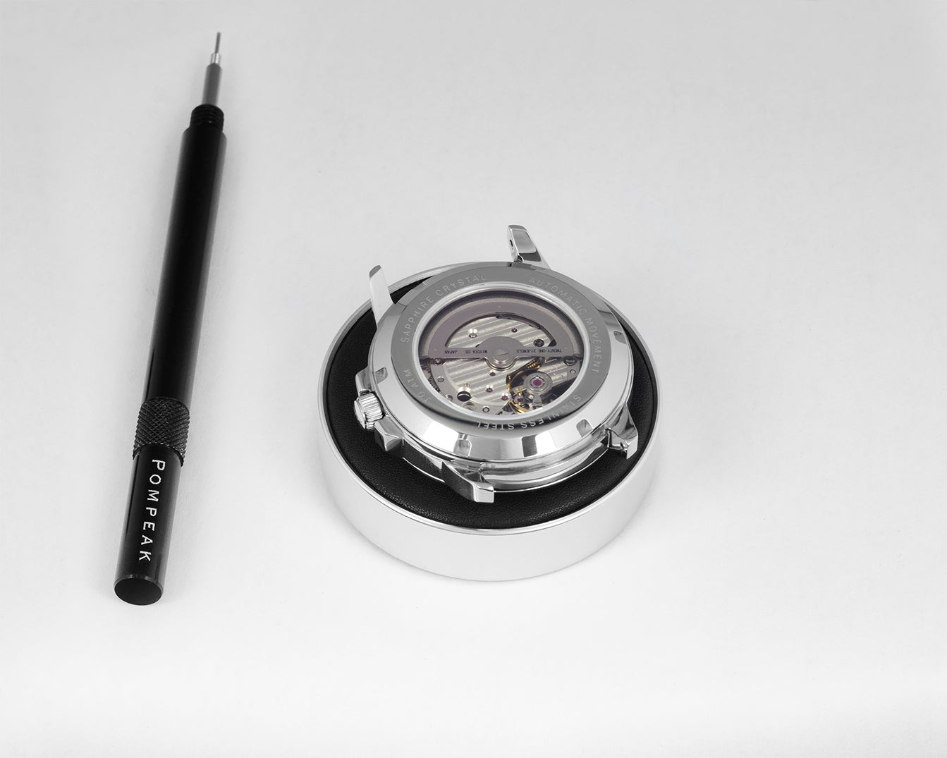 Pompeak automatic watch with exhibition sapphire glass back.