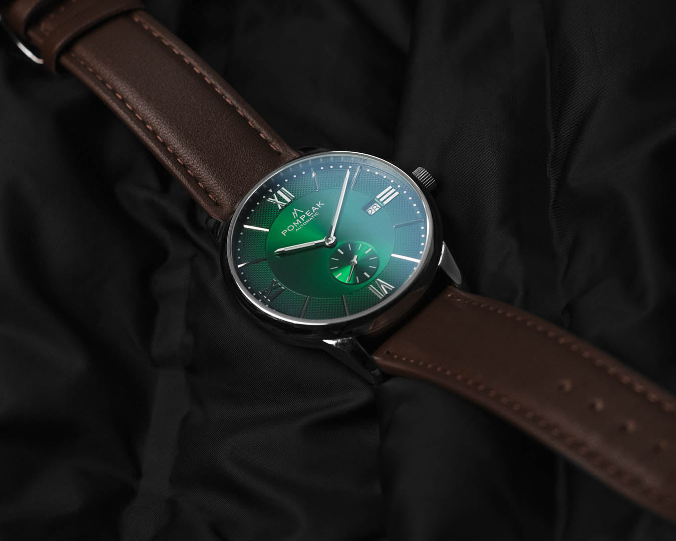 Mallory British Racing Green watch on a brown top-grain leather strap, combining rich green tones with classic craftsmanship.