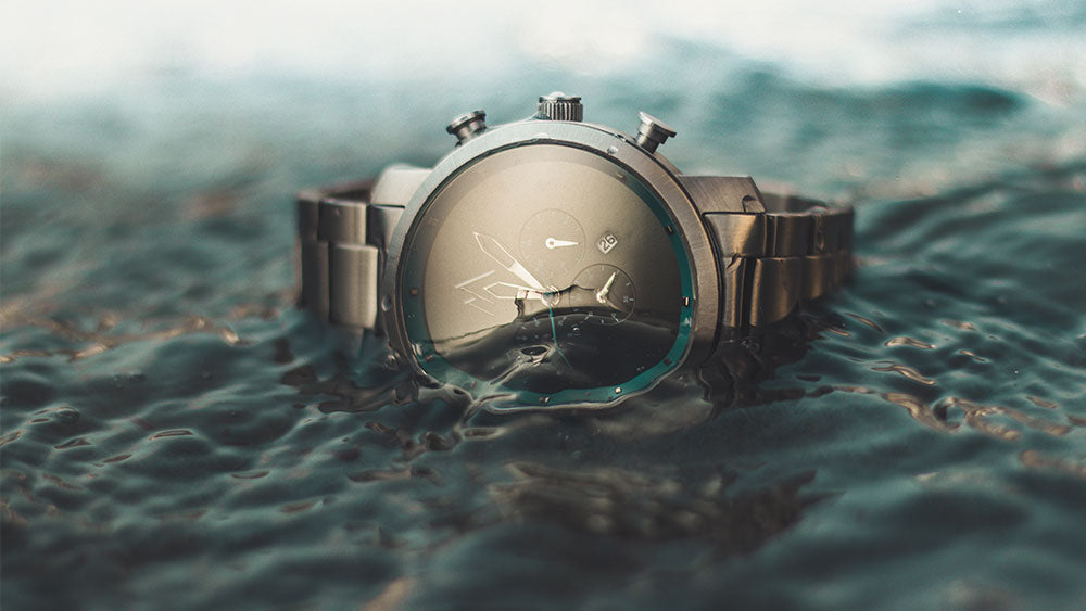 Pompeak Silver Sky Watch In Water Demonstrating Water Resistance