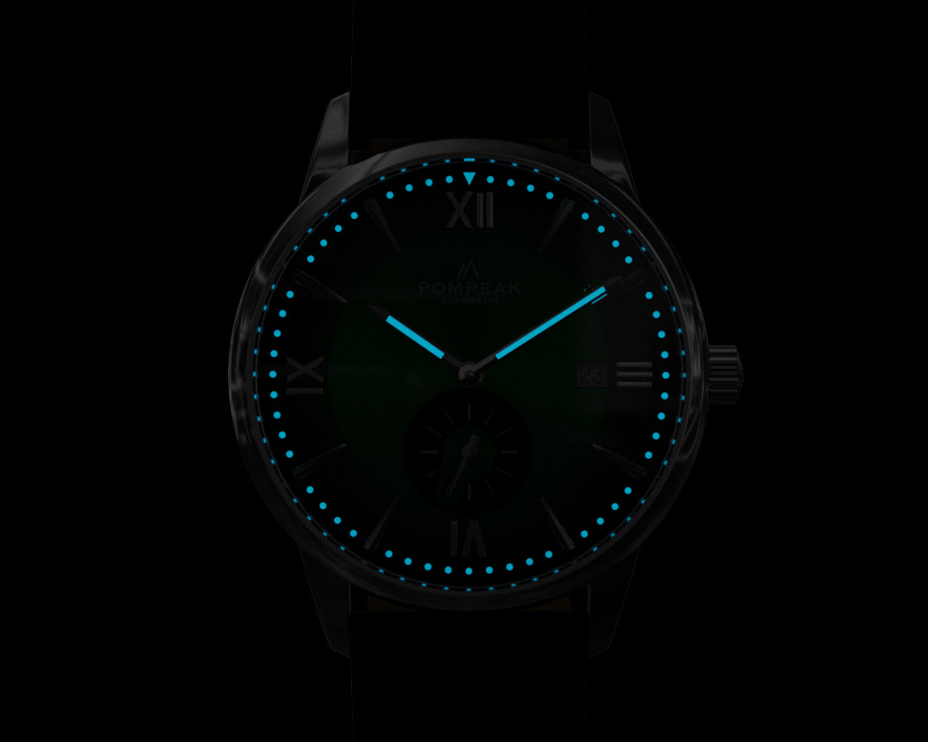 Mallory British Racing Green watch glowing in the dark with BGW9 Super-LumiNova, emitting a crisp mint blue light for night-time visibility.