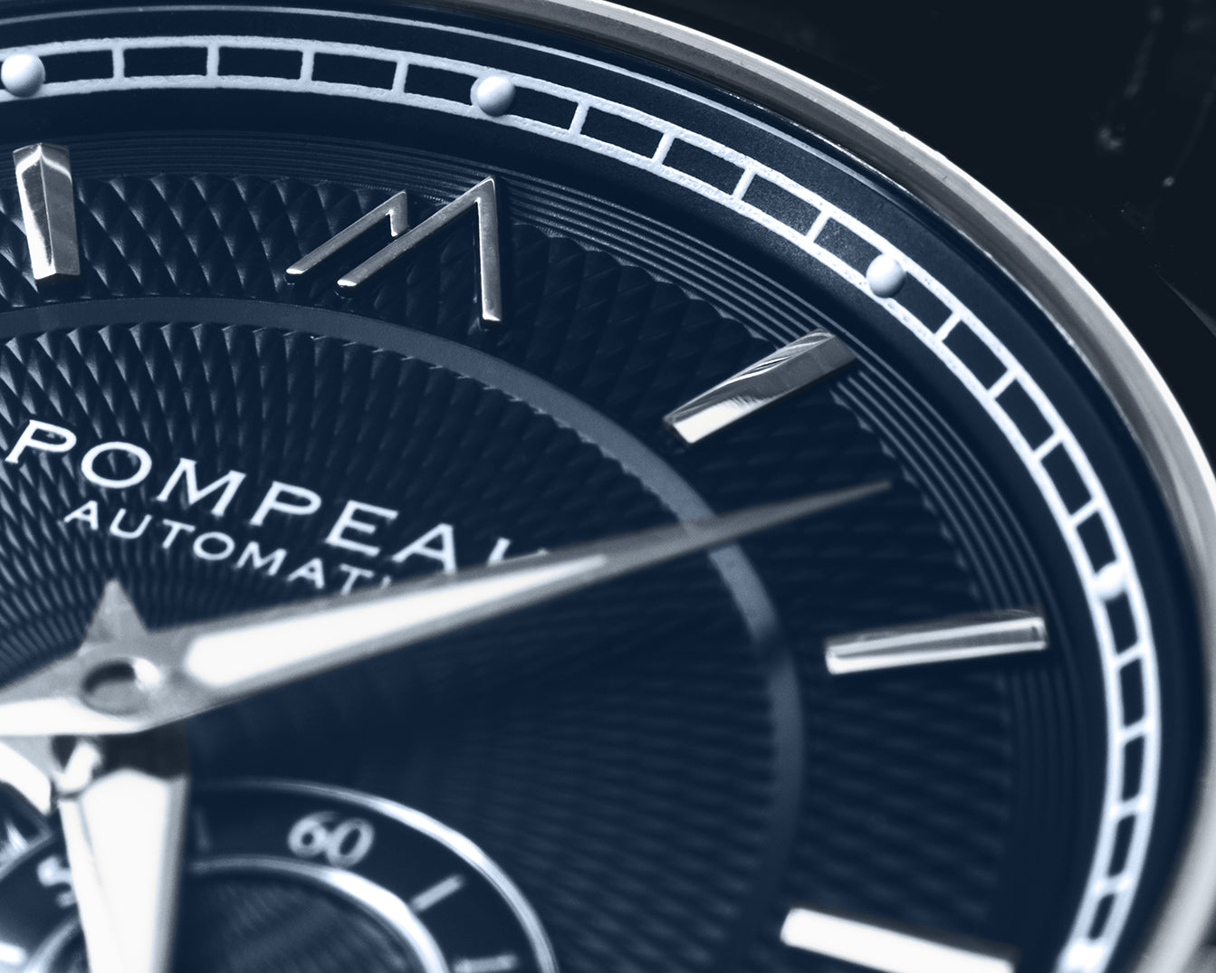 Pompeak automatic navy watch macro dial image.