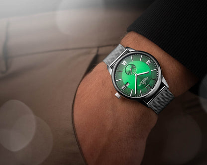 Mallory British Racing Green dress watch worn on a stainless steel Milanese mesh strap, offering a refined and contemporary look.