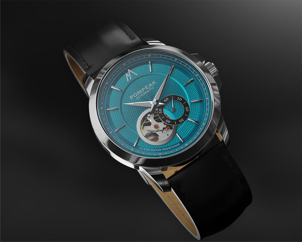 guilloche watch with blue open heart dial and black strap on a dark background