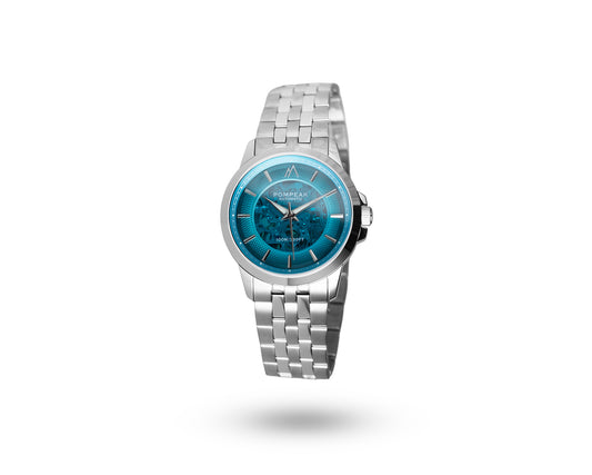 A silver-tone stainless steel watch with a blue dial, shown floating against a solid white background.