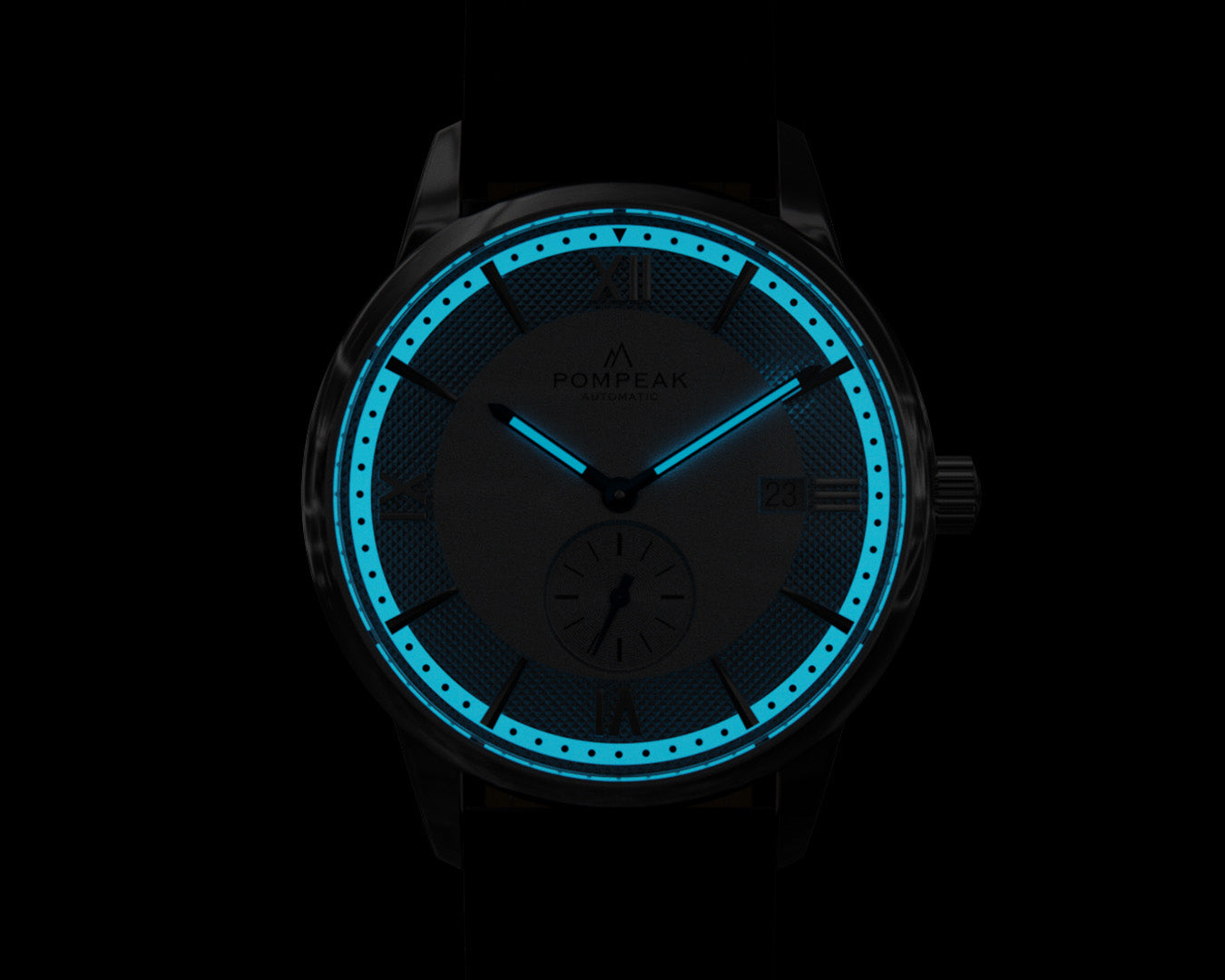 BGW9 Super-LumiNova glowing on the Mallory Timeless White watch, providing long-lasting mint blue luminescence in the dark.